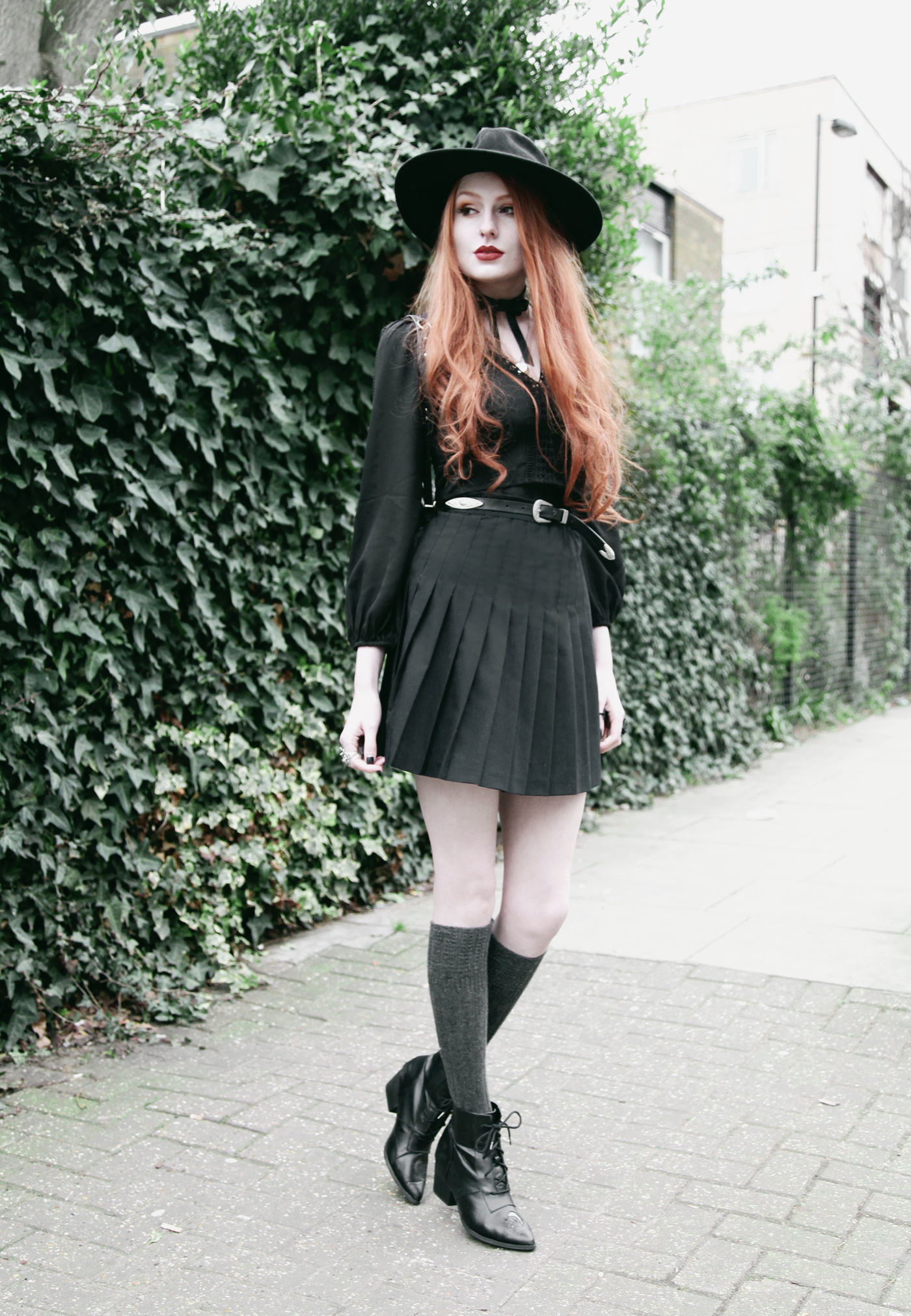 Olivia Emily wears Asos folk crop top, Valfre Bowie choker, American Apparel pleated skirt and YRU Aura boots