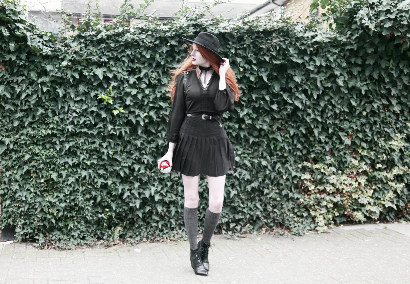 Olivia Emily wears Asos folk crop top, Valfre Bowie choker, American Apparel pleated skirt and YRU Aura boots