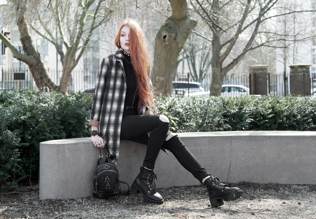 Olivia Emily wears Brave Soul Plaid Overcoat, Asos Black Zip Halter Top, Asos Ridley Ripped Jeans, Unif Dedi Boots and Unif Bound Mini Backpack