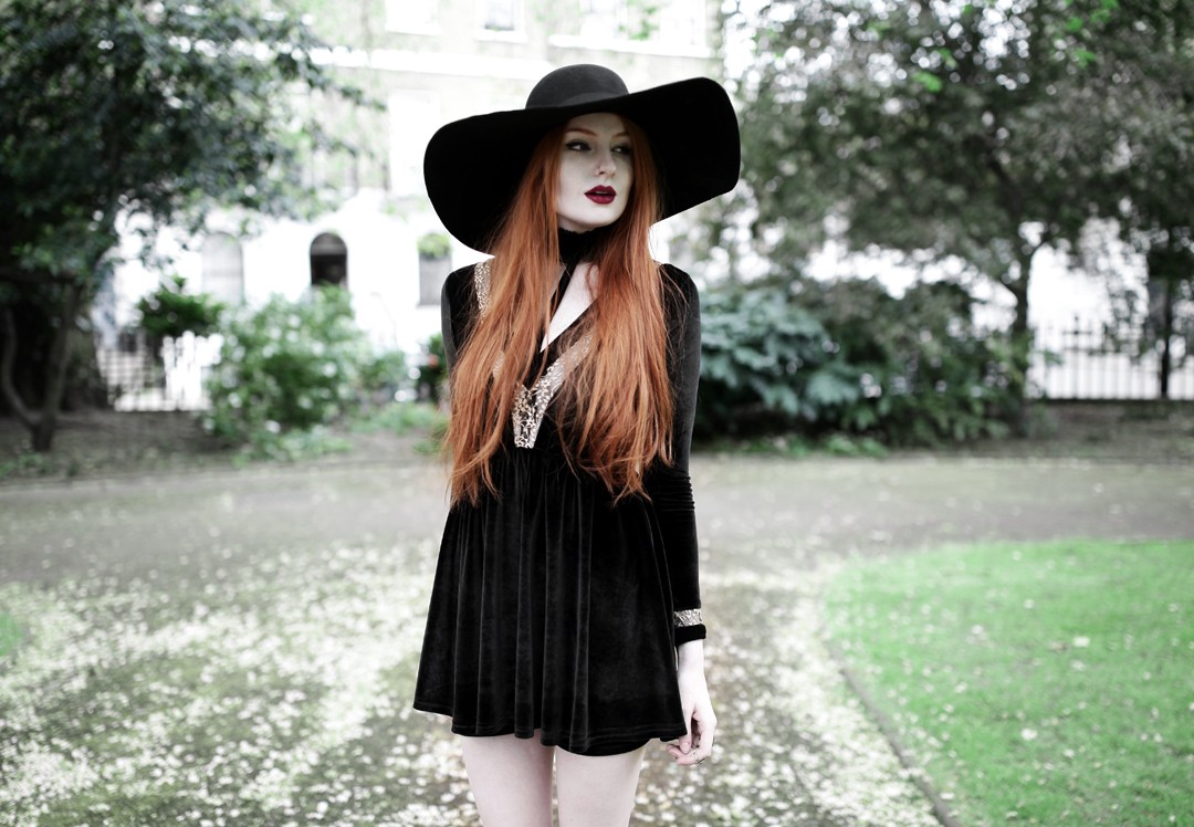 Olivia Emily wears Dark Thorn Clothing Victoria Dress, Asos Floppy Wide Brim Hat, Rogue and Wolf Jewellery, and Ash Boots