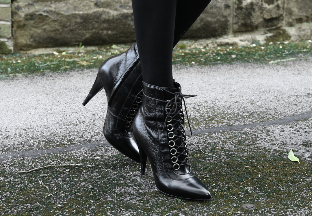 Olivia Emily wears Saint Laurent Fetish Lace Up Ankle Boots