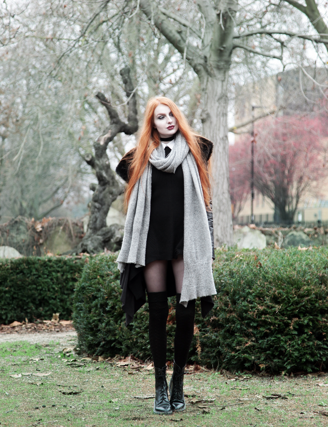 Olivia Emily wears Church of Sanctus Asylum Vegan Suede Faux Fur Coat, Asos Grey Wool Scarf, L Necklace, Killstar Hellda Knit Dress, Asos Over Knee Socks, Pointed Toe Dr Martens