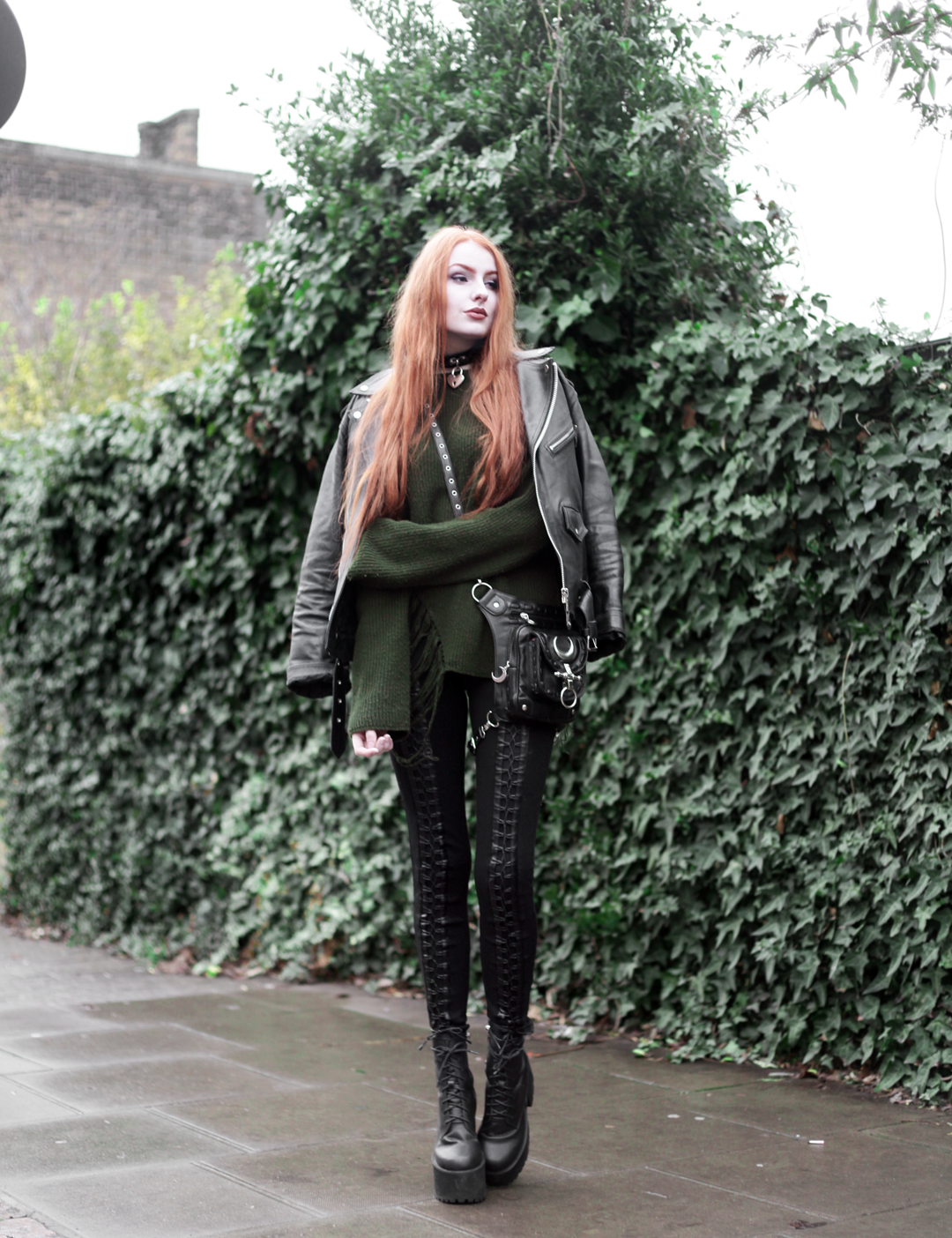 Olivia Emily wears Biker Jacket, Asos Bones Oversized jumper, Restyle pl harness bag, Stylestalker lace up leggings trousers, Unif scosche boots