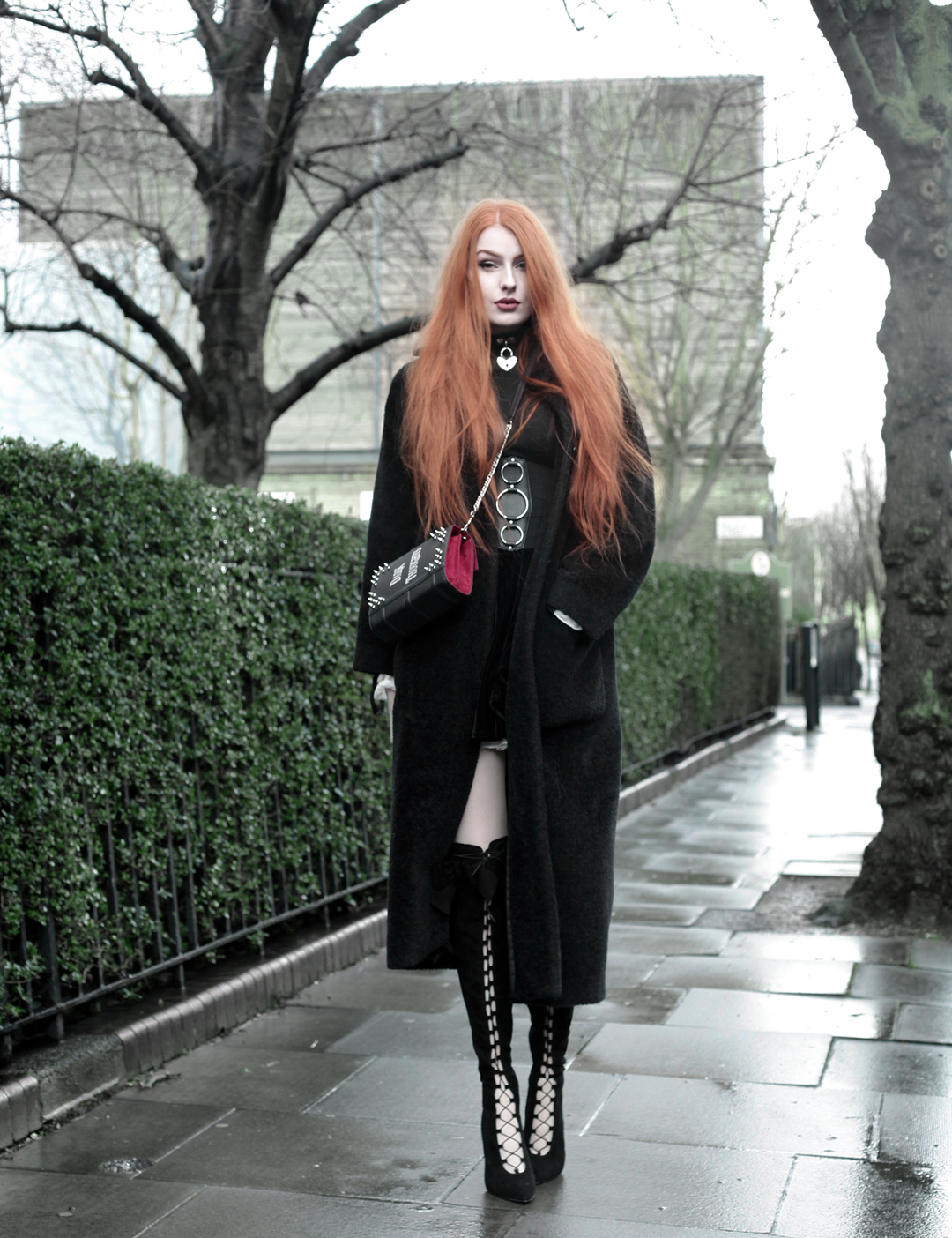 Olivia Emily wears Skinny Bags Dark Thoughts Book Clutch, Vintage Max Mara coat, and Asos Lace Up Boots