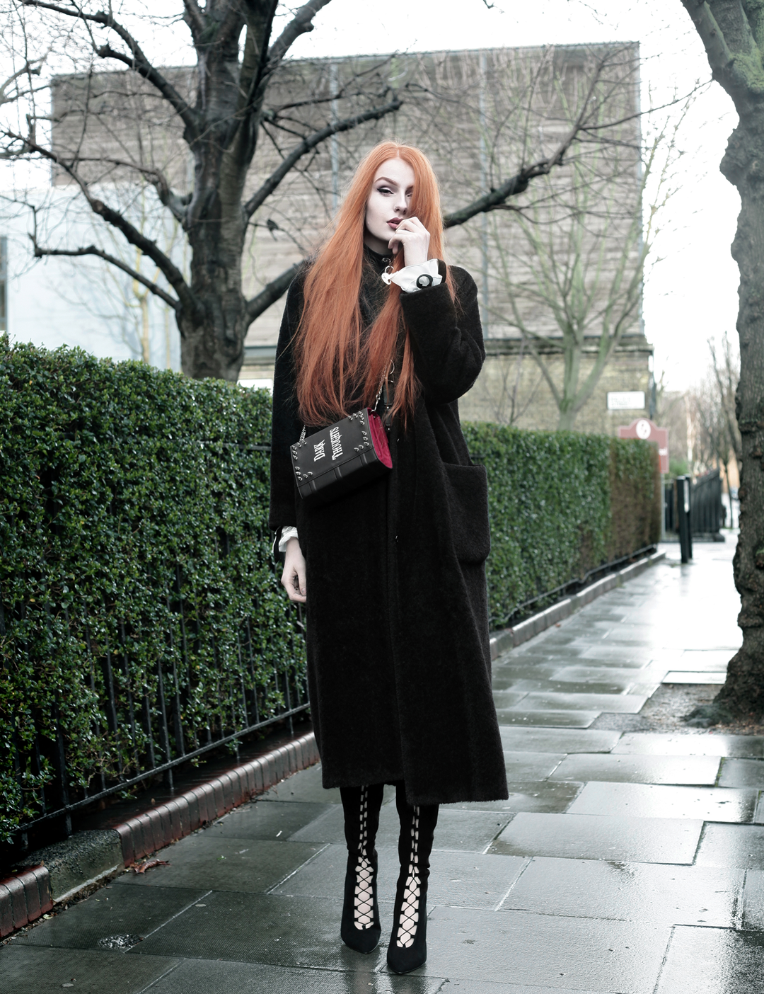 Olivia Emily wears Skinny Bags Dark Thoughts Clutch, Vintage Max Mara coat, and Asos Lace Up Boots