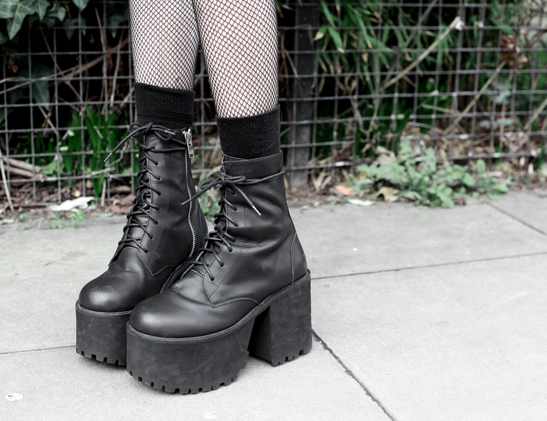 Olivia Emily wears Unif Scosche Boots