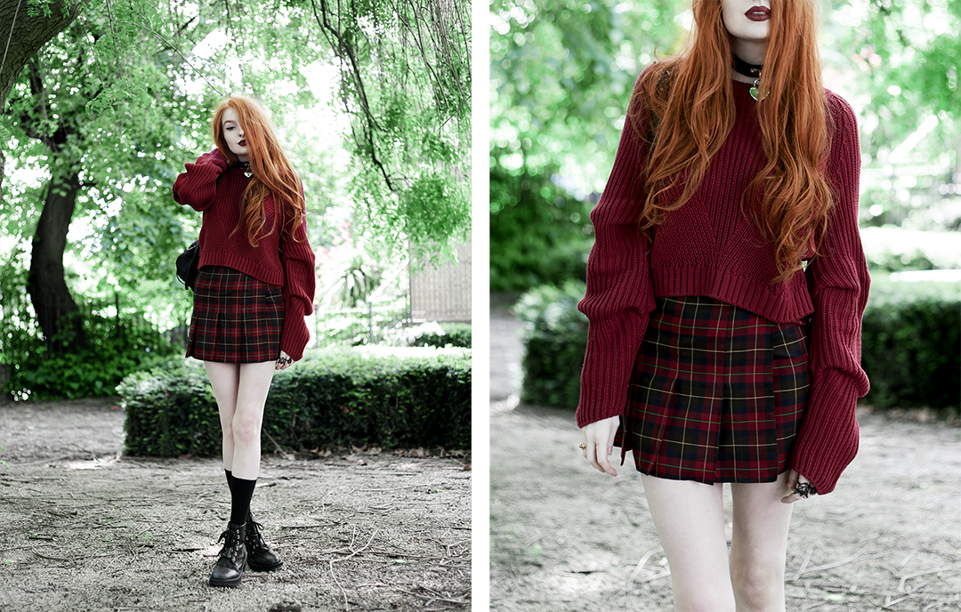 Olivia Emily wears River Island Studio Red Jumper, Topshop red plaid check skirt, Killstar Heart Choker, and Unif Dedi Boots