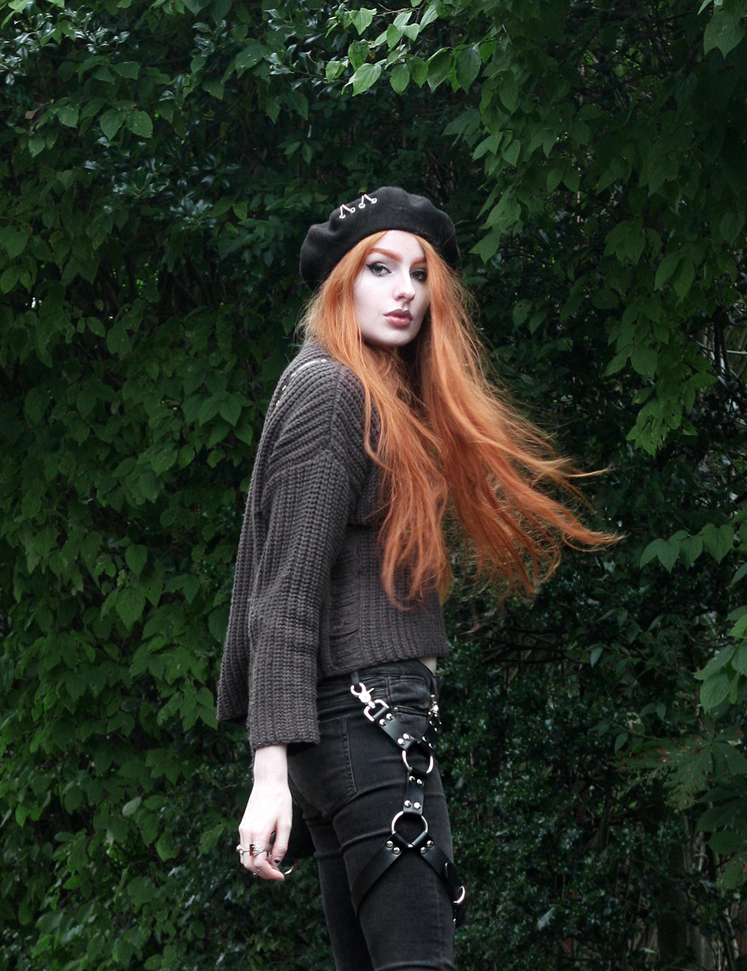 Hello 2018 - Olivia Emily wears Shikumi Beret, Current Mood High Neck Jumper, Asos Ridley Ripped Jeans, and Dolls Kill Leg Harness